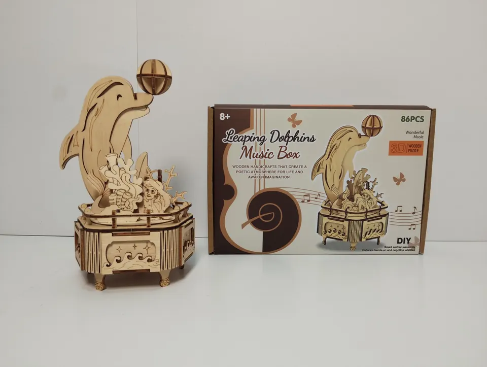 Clockwork Jumping Dolphin Love Sea Music Box (86pcs) Color Box wholesale from Qili Toys