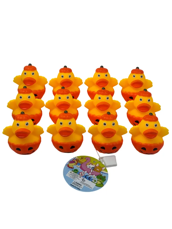 Cute Rubber Ducky Shaped Like A Pumpkin, Designed For Bath Time Play. Mesh Bag wholesale from Qili Toys