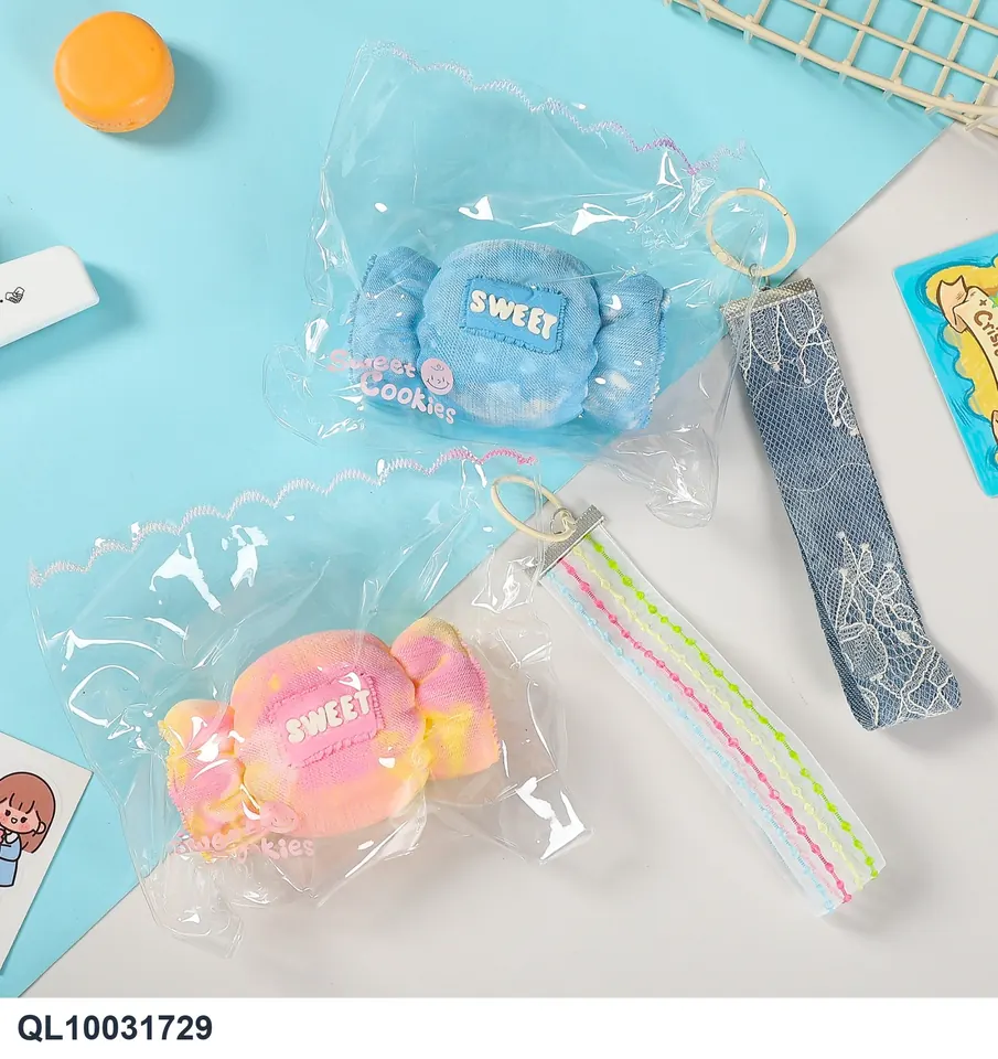 "Playful Patchwork Clay" - Silicone Clay For Stress Relief And Fidgeting. Features A Soft, Pliable Texture That Mimics The Feel Of Wet Clay. Also Includes Keychains And Charms. OPP Bag wholesale from Qili Toys
